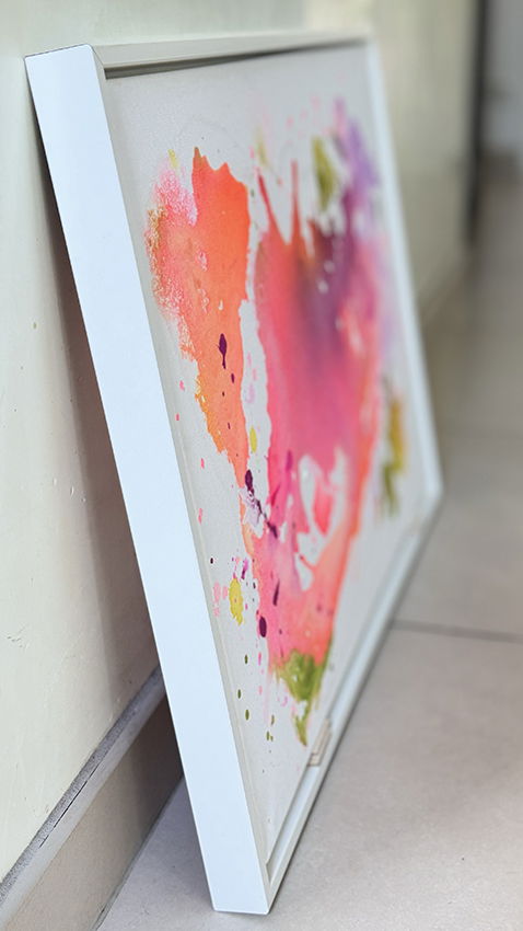 Abstract acrylic painting on canvas with vibrant splatters of pink, orange, yellow, and green, evoking fluid energy and spontaneous motion. Abstrakt style, Acryl auf Leinwand.