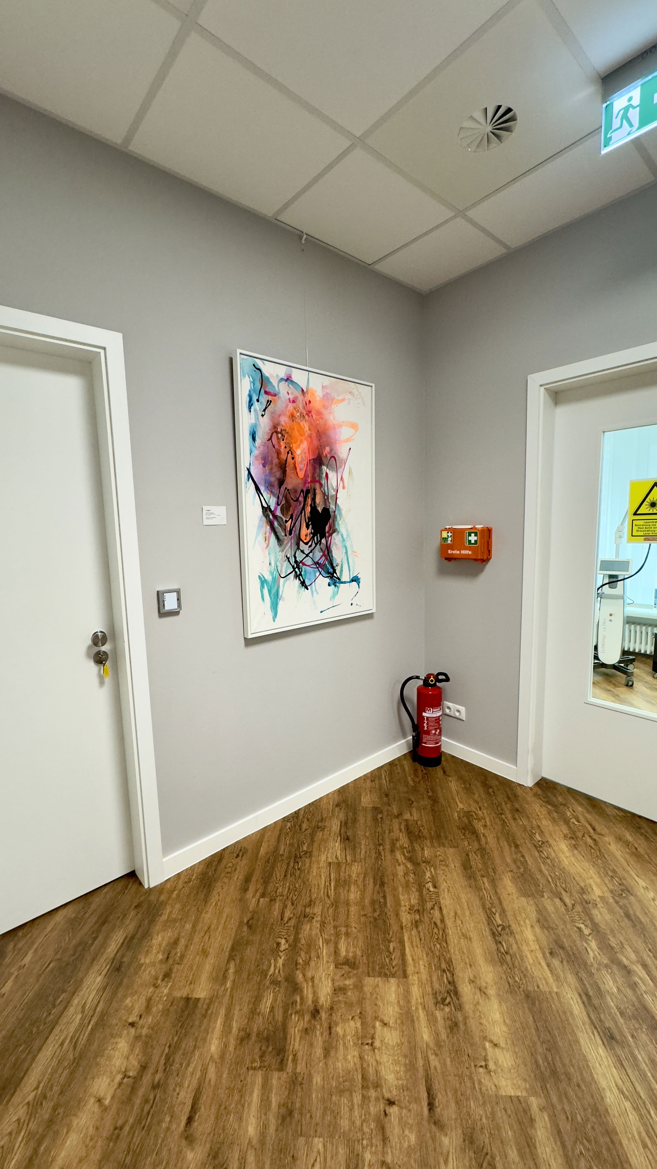 Abstract acrylic painting on canvas, exuding vibrant chaos and fluidity with dynamic brushstrokes of orange, blue, pink, and black, embodying spontaneous energy. Artwork style is Abstrakt and technique Acryl auf Leinwand.