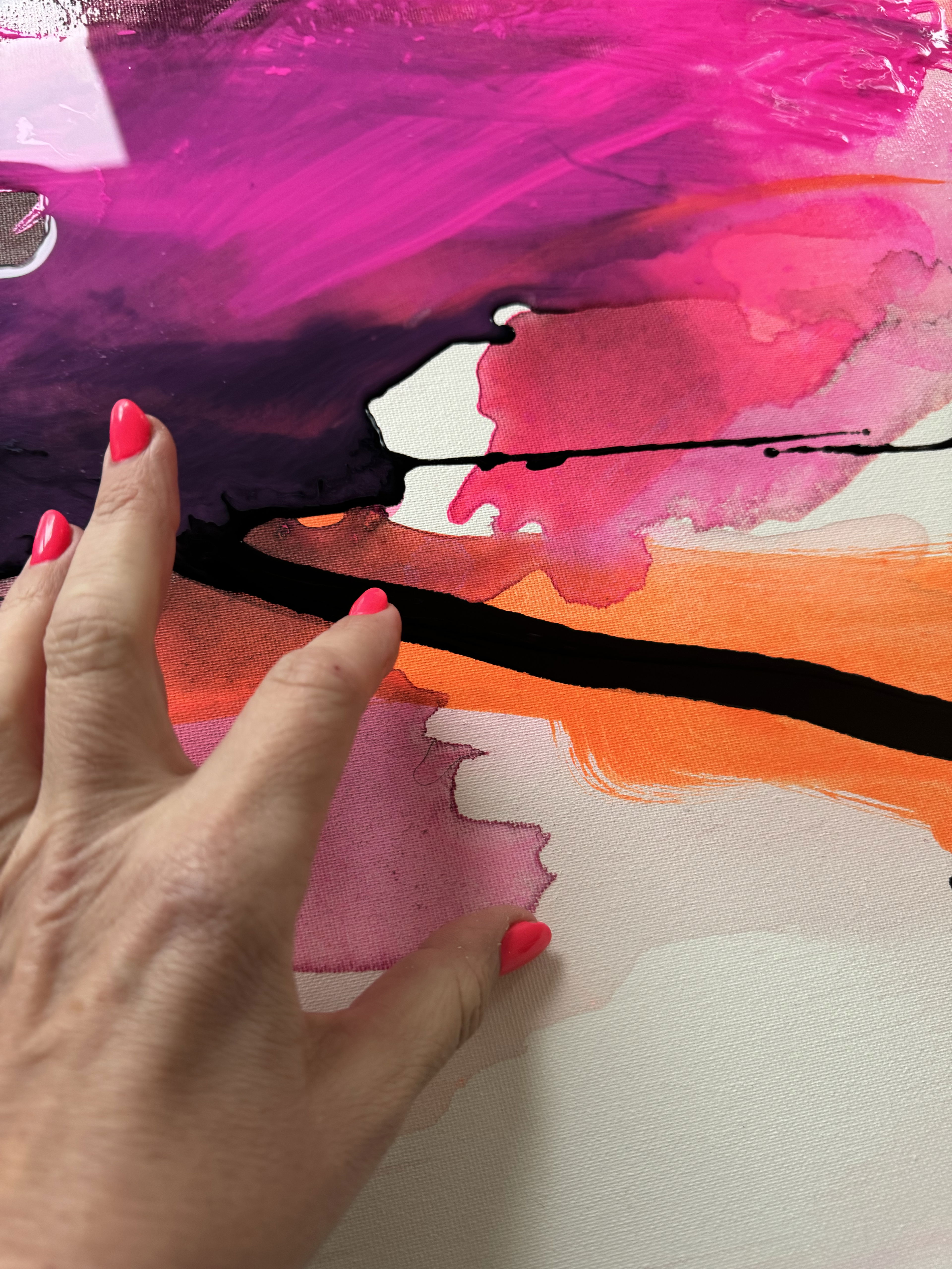 An abstract acrylic painting on canvas, featuring vibrant strokes of pink, orange, and black, evoking a sense of chaos and ethereal beauty through fluid brushwork. Artwork style is Abstrakt and technique Acry auf Leinwand.