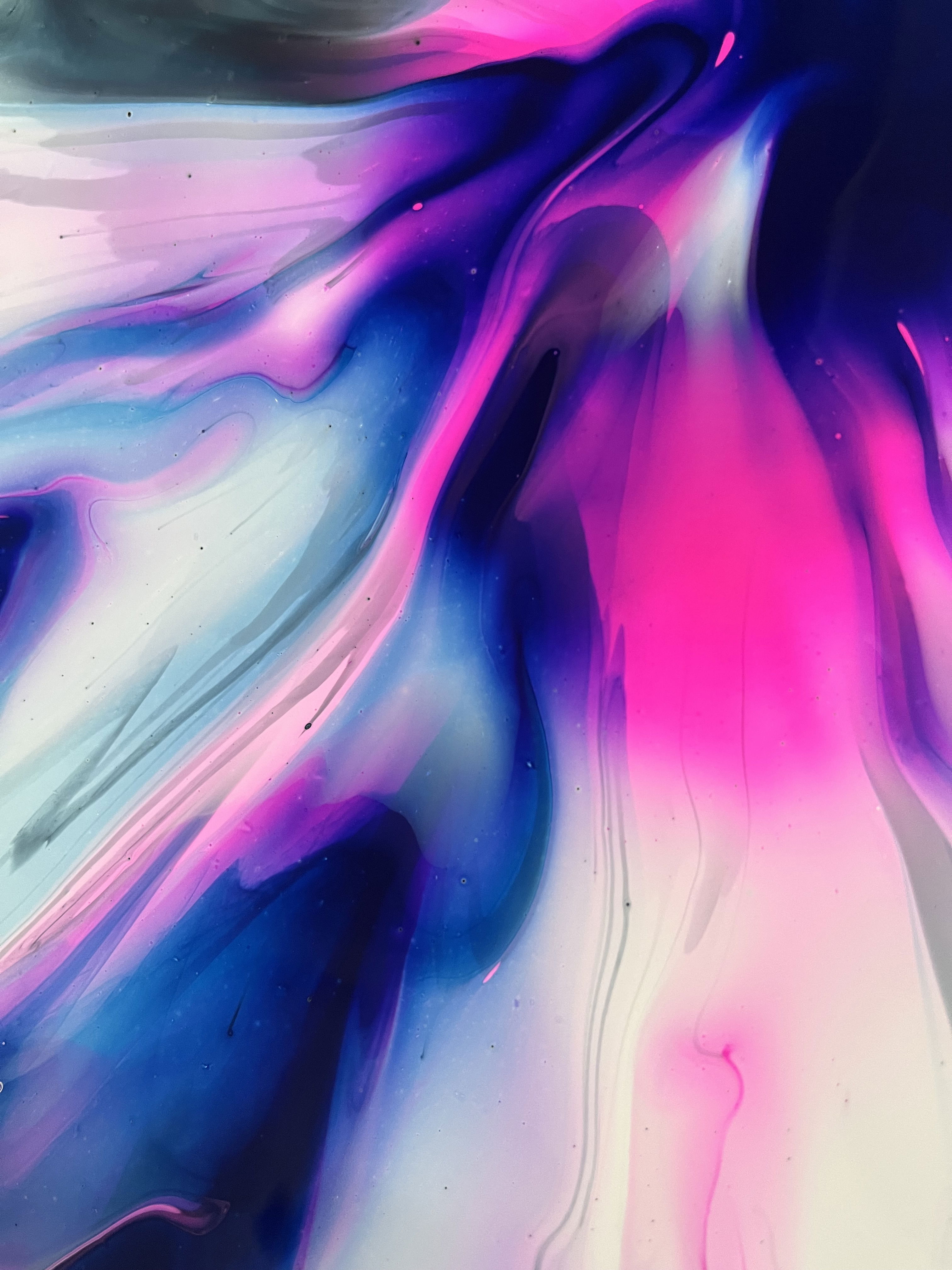 Acrylic on canvas abstract artwork with vibrant cerulean and magenta swirls, evoking a sense of fluidity and depth, like an ethereal cosmic vortex in motion. Artwork style is Abstrakt and technique Acryl auf Leinwand.