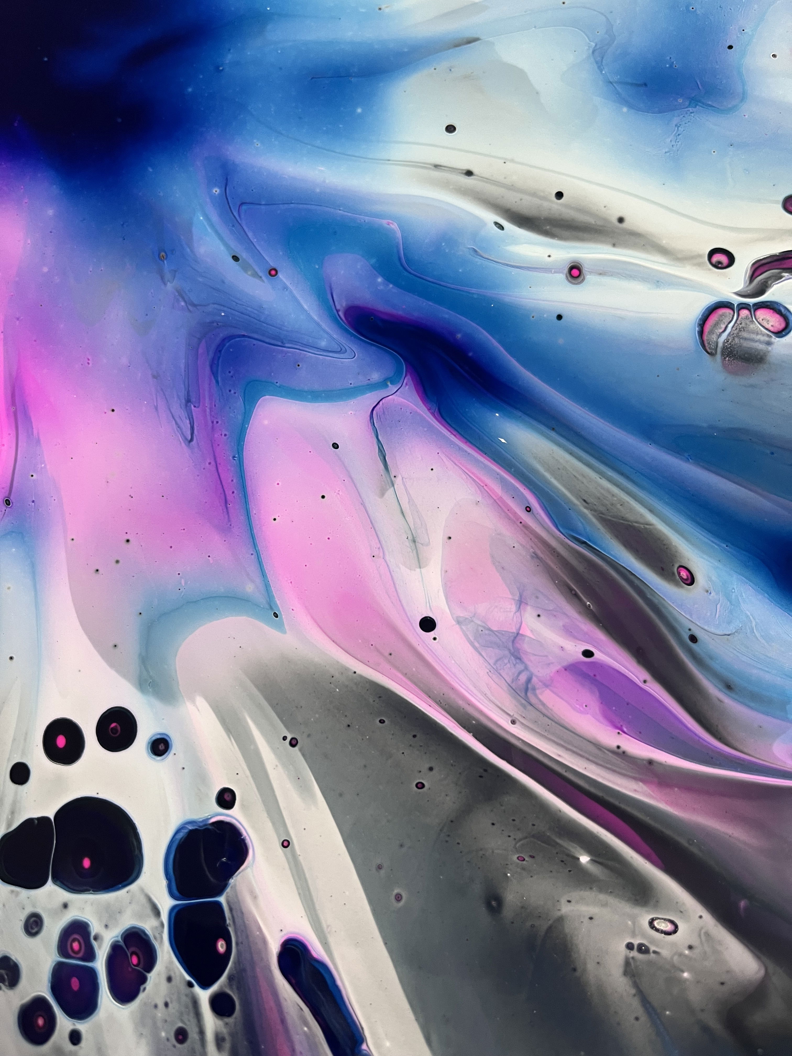 A captivating acrylic on canvas abstract, swirling with cerulean blues and magenta tones, evokes cosmic fluidity and ethereal luminosity in a harmonious dance of color. Artwork style is Abstrakt and technique Acryl auf Leinwand.