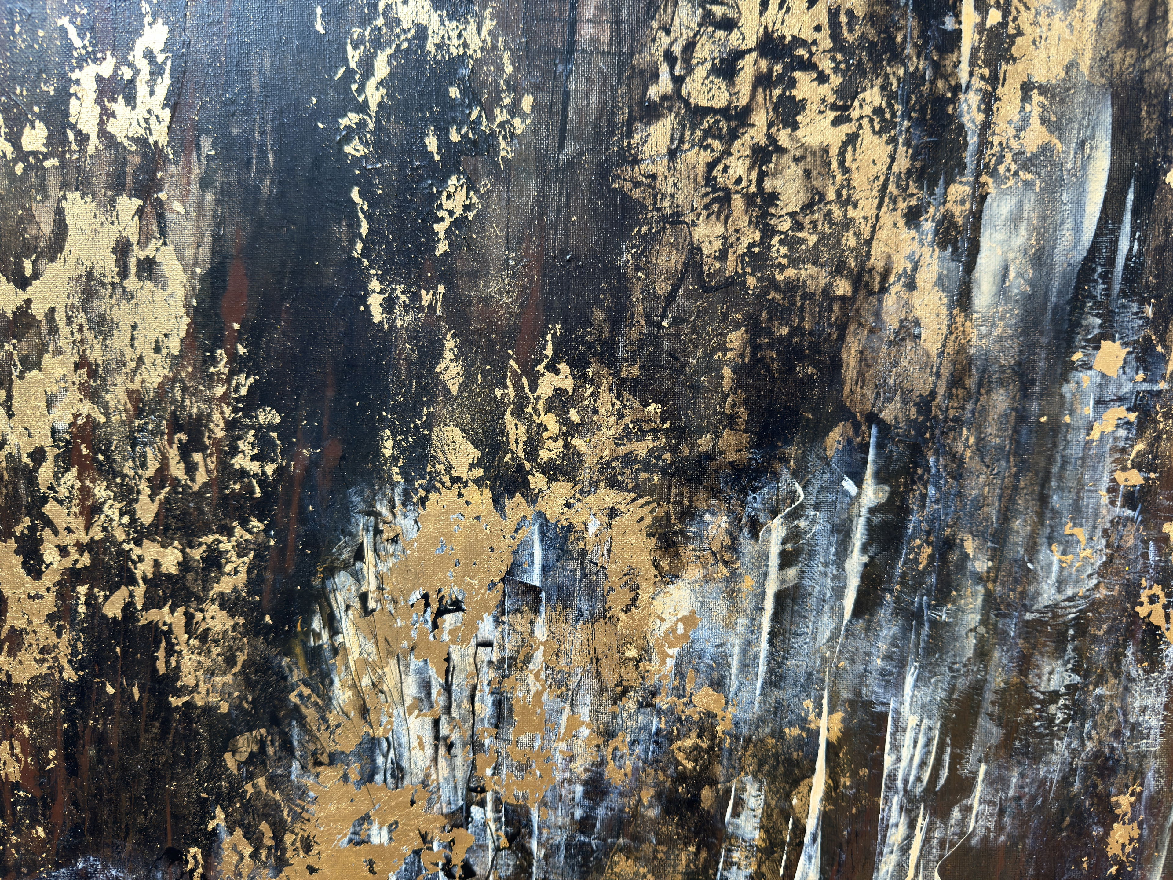 Acrylic abstract artwork on canvas with gold leaf accents emerges from dark, textured depths, evoking luminescence and mystery in a complex interplay of shadow and brilliance. Artwork style - Abstrakt and technique Acryl auf Leinwand.