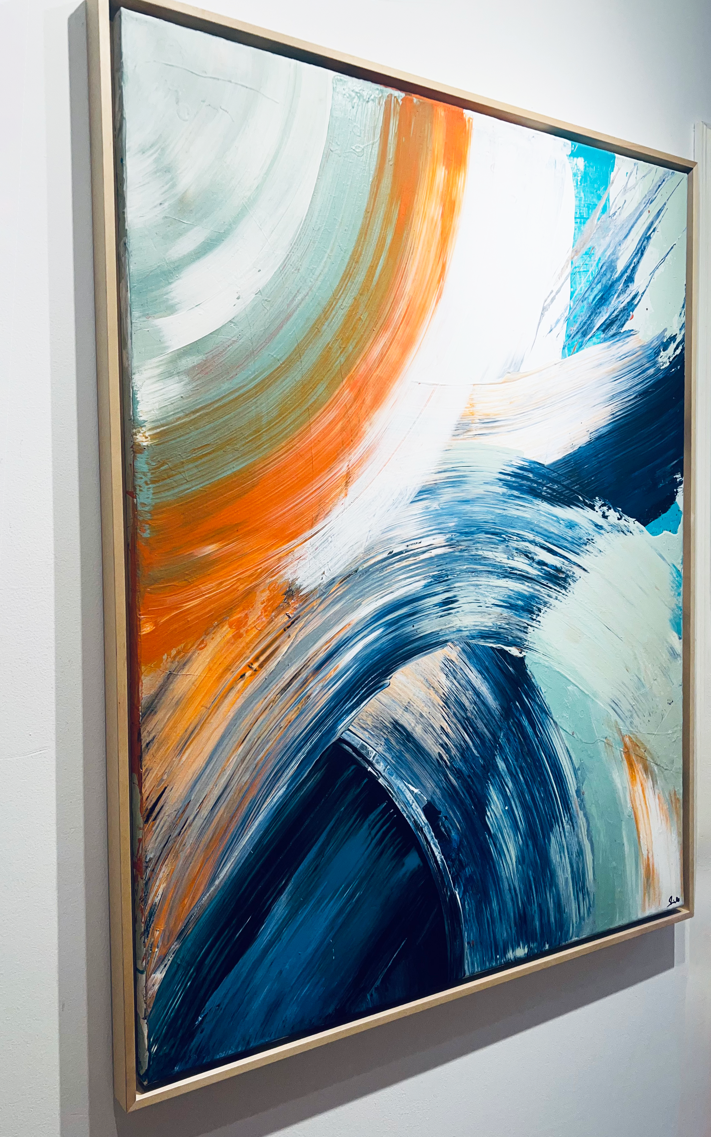 Abstract acrylic on canvas painting featuring dynamic swirls in azure, forest green, and ochre hues, blending harmoniously to create a sense of fluidity and motion. Artwork style - Abstrakt and technique Acryl auf Leinwand.