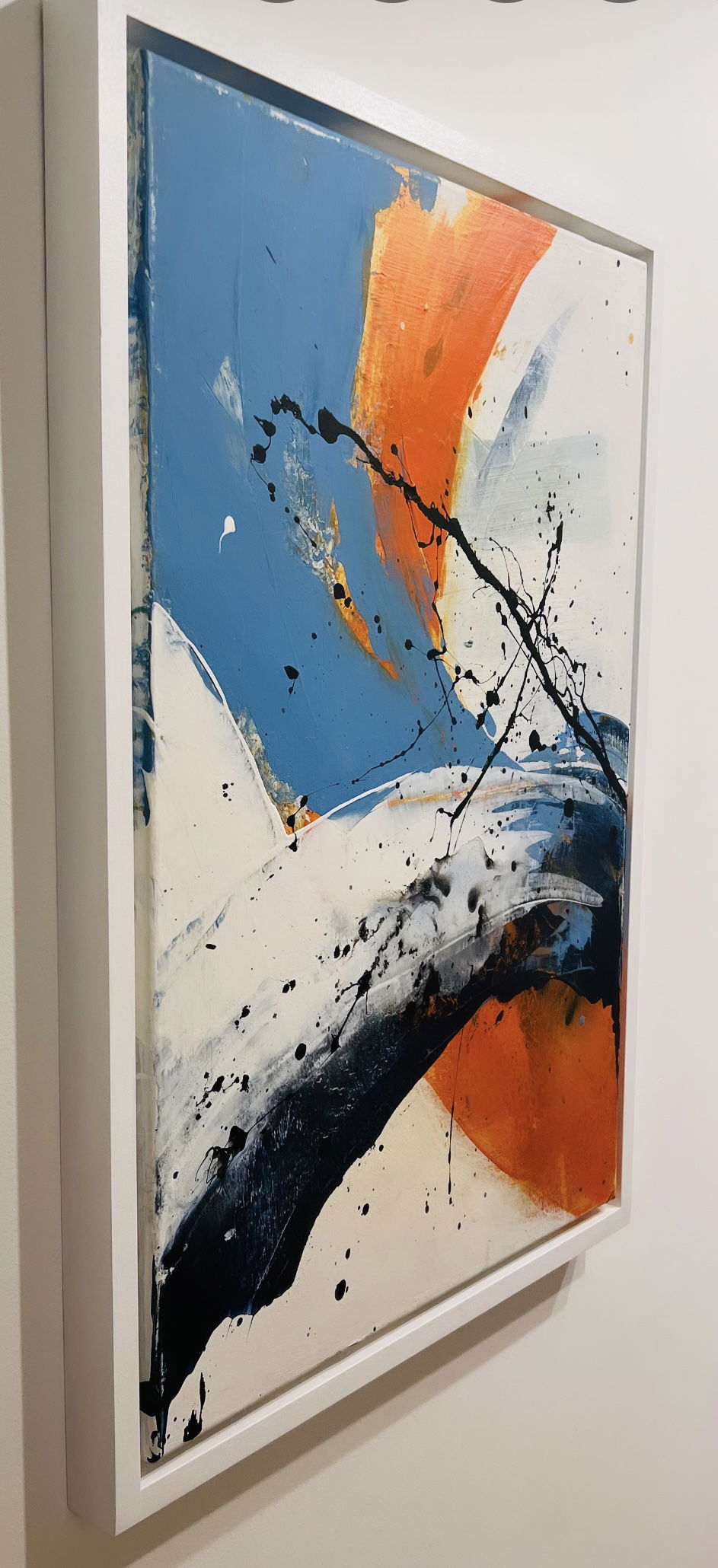 Abstract acrylic painting on canvas showcasing bold strokes in cobalt blue and fiery crimson, splattered with ebony ink. A dynamic collision of colors and fluidity. Artwork style - Abstrakt and technique Acryl auf Leinwand.