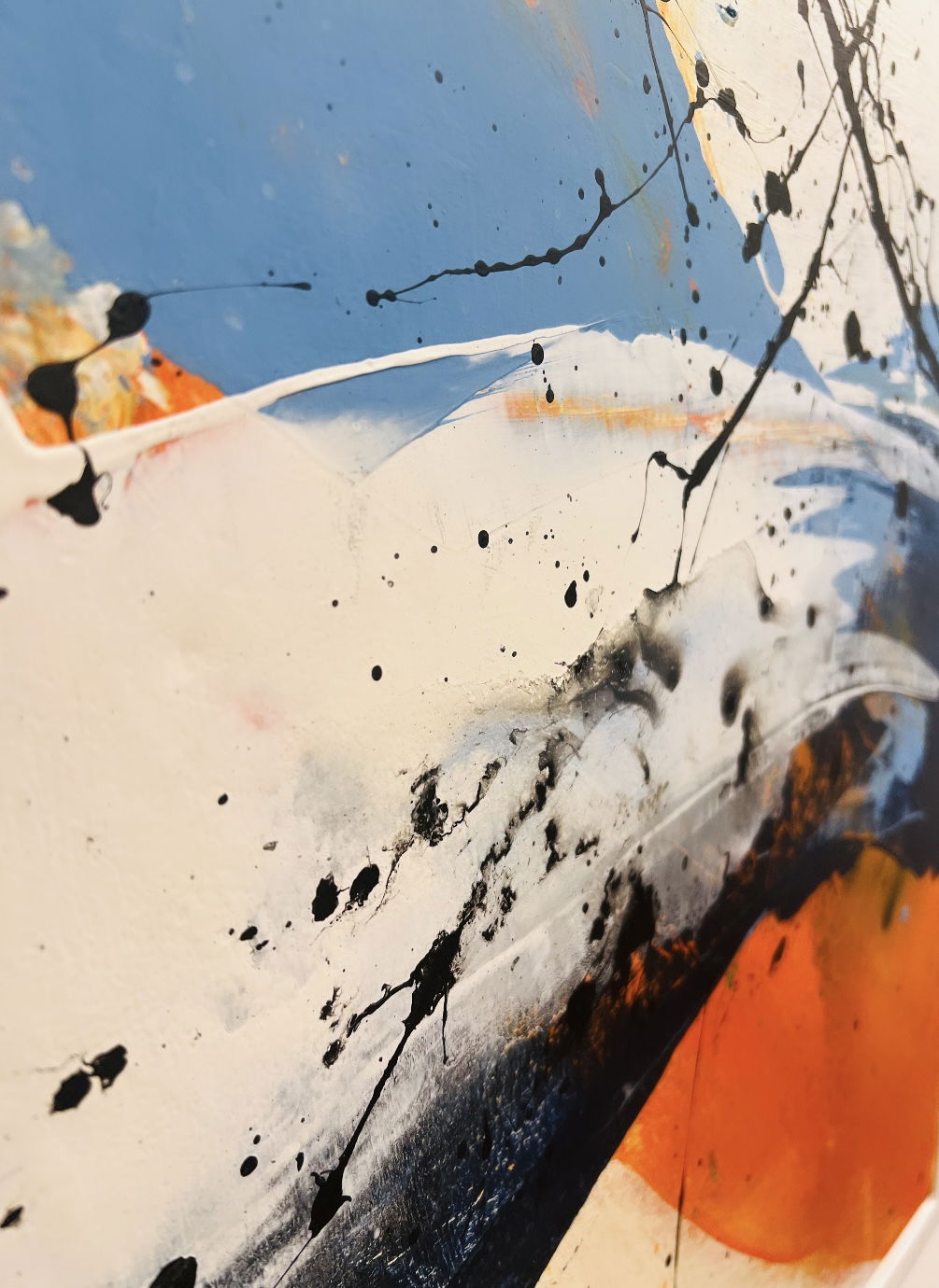 A dynamic abstract acrylic painting on canvas, rich with splashes of cobalt, crimson, and ebony hues, showcases fluid, dramatic strokes interplaying with serene, sweeping arcs. Artwork style - Abstrakt and technique Acryl auf Leinwand.