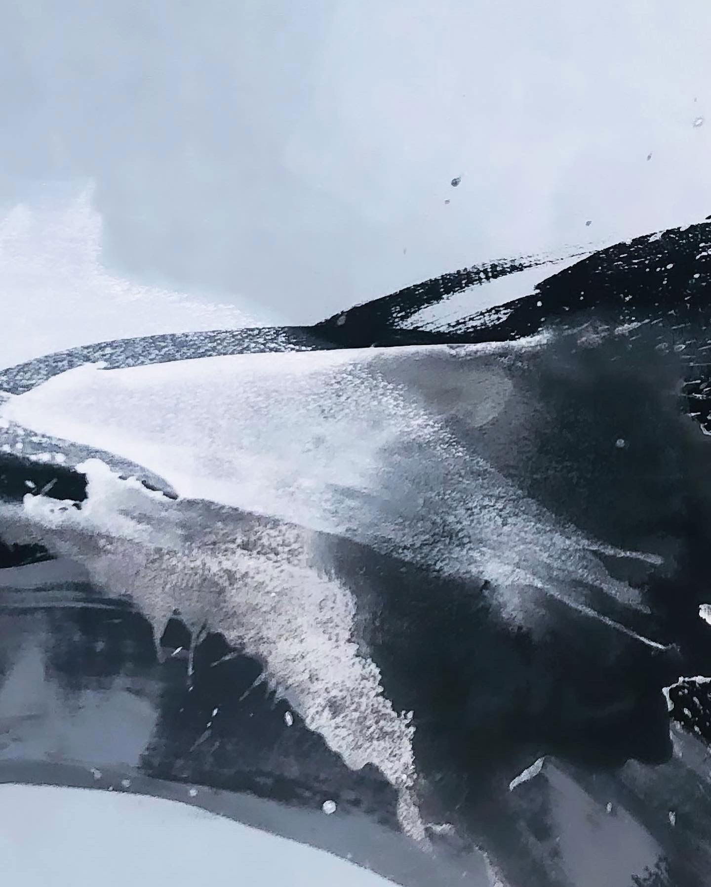 An abstract acrylic on canvas exuding monochrome turbulence; fluid splatters and bold contrasts create a dynamic, textured interplay of grayscale shadows that evoke a mysterious cascade. Artwork style - Abstrakt and technique Acryl auf Leinwand.