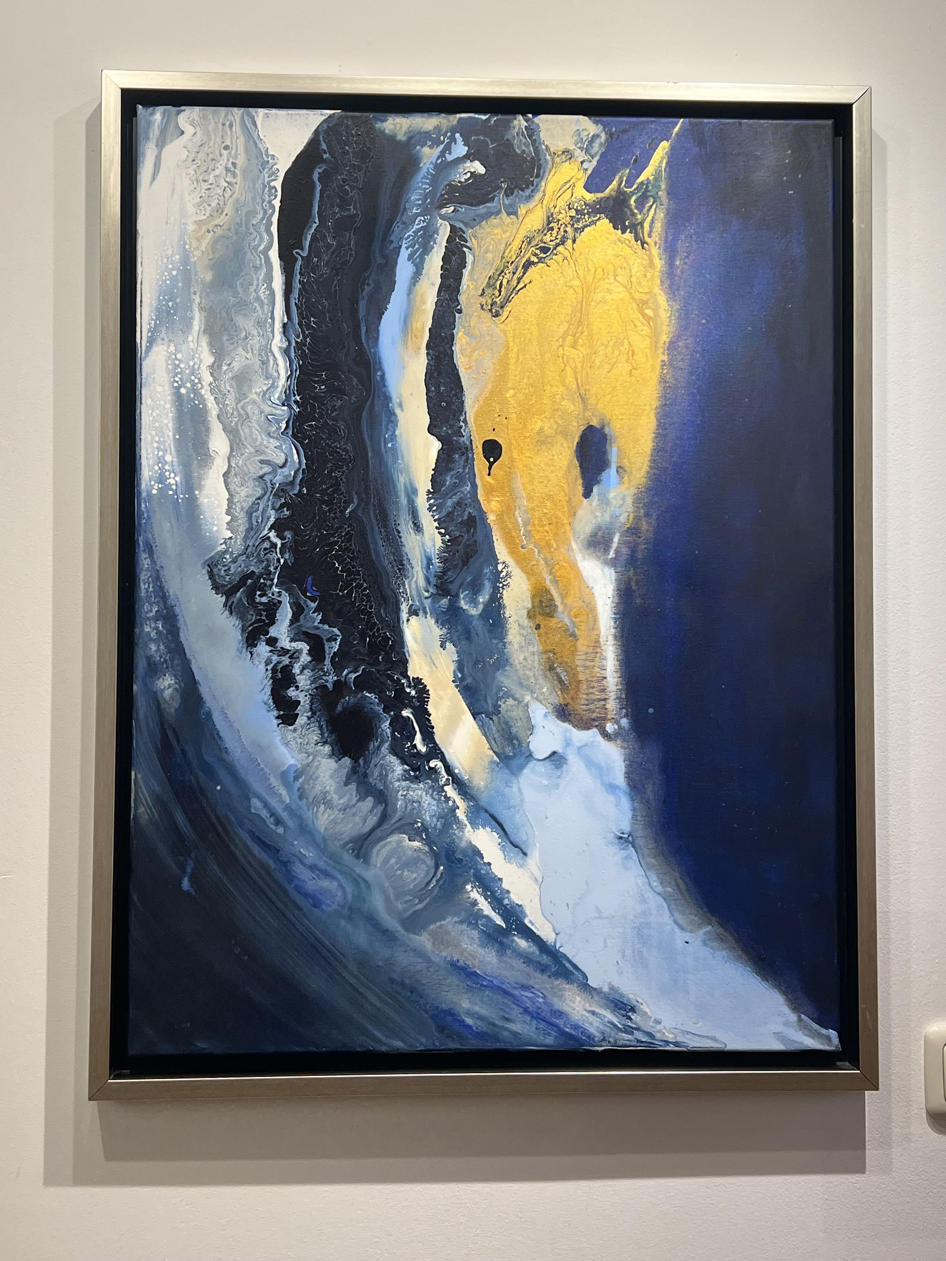 Abstract acrylic painting on canvas, featuring fluid cascades of azure, obsidian, and golden hues, evoking an ethereal celestial tempest and cosmic iridescence. Artwork style - Abstrakt and technique Acryl auf Leinwand.