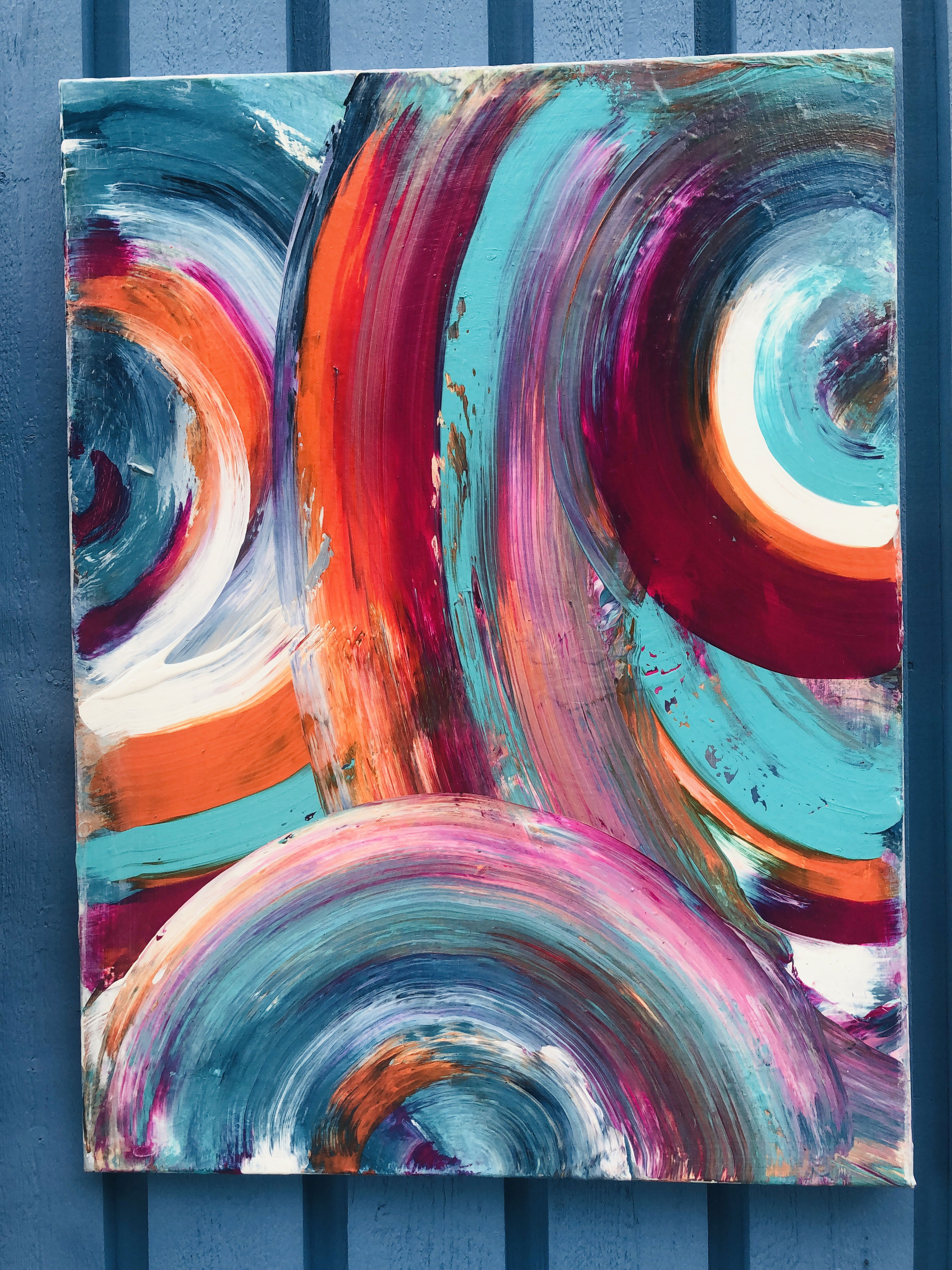 Abstract acrylic on canvas showcases vibrant swirls of teal, crimson, and coral, with dynamic brushstrokes creating fluid motion and passionate energy. Artwork style is Abstrakt and technique Acryl auf Leinwand.