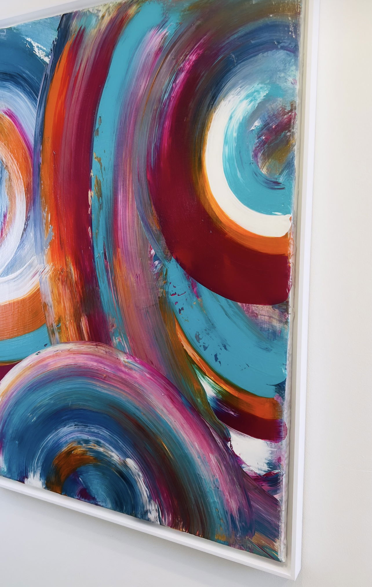 Abstract acrylic painting on canvas featuring vibrant swirls of teal, crimson, and magenta, exuding energy and fluidity through dynamic brushstrokes. Artwork style is Abstrakt and technique Acryl auf Leinwand.